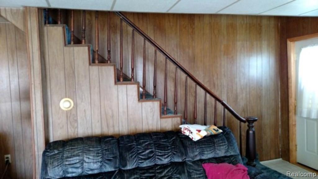 9183 Metcalf Road Avoca, MI 48006 - Photo 9 of 18 This is a view of the stairway to the second floor.