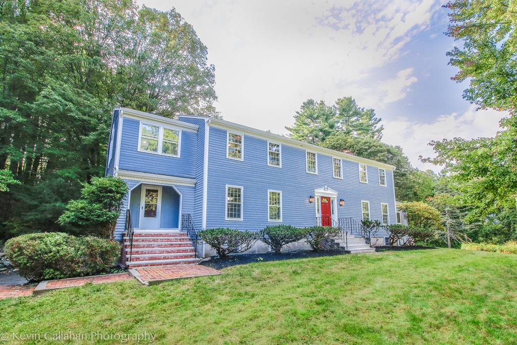 14 Pine Hill Road Framingham, MA 01701 - Photo 2 of 26 a front view of a house with a yard