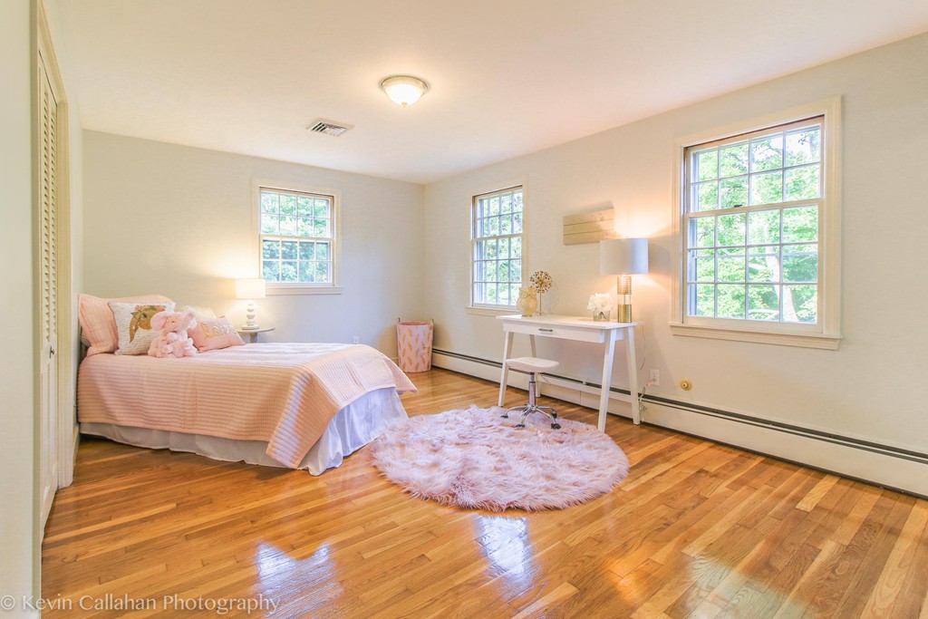 14 Pine Hill Road Framingham, MA 01701 - Photo 21 of 26 a bedroom with a bed and a window