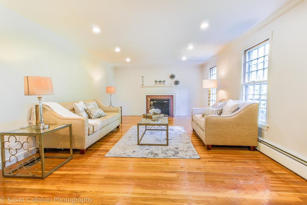 14 Pine Hill Road Framingham, MA 01701 - Photo 5 of 26 a living room with furniture and a fireplace