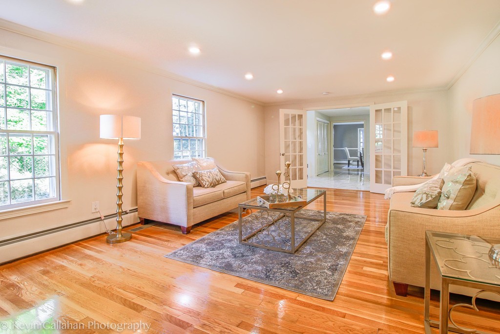 14 Pine Hill Road Framingham, MA 01701 - Photo 6 of 26 a living room with furniture and a table