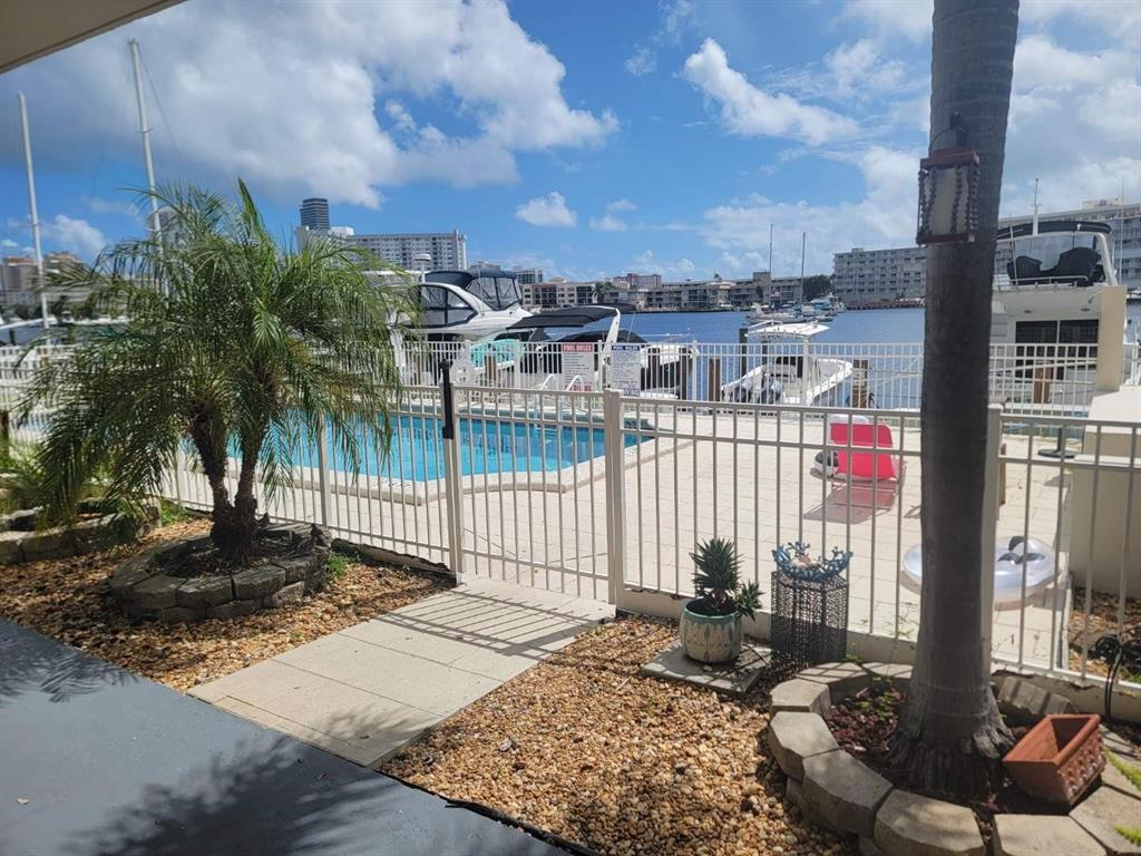 2100 Diana Drive, Unit 107 Hallandale Beach, FL 33009 - Photo 2 of 9 a city view with tall buildings