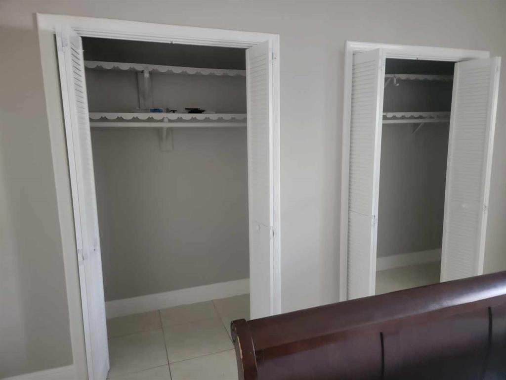2100 Diana Drive, Unit 107 Hallandale Beach, FL 33009 - Photo 8 of 9 a room with closet