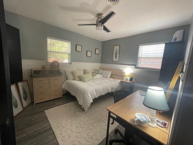 5611 16th Place Lubbock, TX 79416 - Photo 16 of 17 a bedroom with furniture and a window
