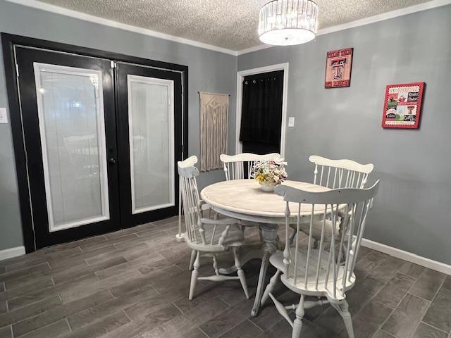 5611 16th Place Lubbock, TX 79416 - Photo 5 of 17 a dining room with furniture a chandelier and wooden floor