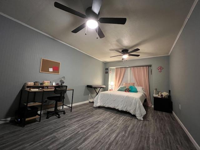 5611 16th Place Lubbock, TX 79416 - Photo 10 of 17 a bedroom with furniture and a window