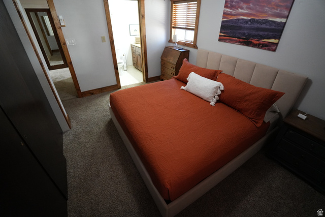 3711 North Canyon Road Provo, UT 84604 - Photo 12 of 42 Bedroom with light colored carpet and ensuite bath