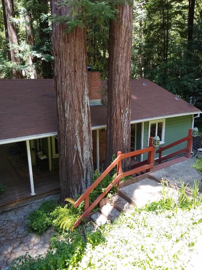 506 Sunset Road Boulder Creek, CA 95006 - Photo 21 of 25 a view of house with backyard and outdoor seating