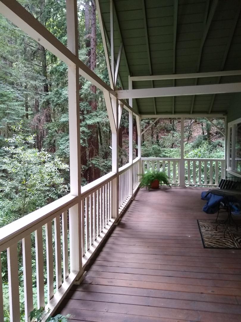 506 Sunset Road Boulder Creek, CA 95006 - Photo 23 of 25 a view of backyard with green space and wooden floor