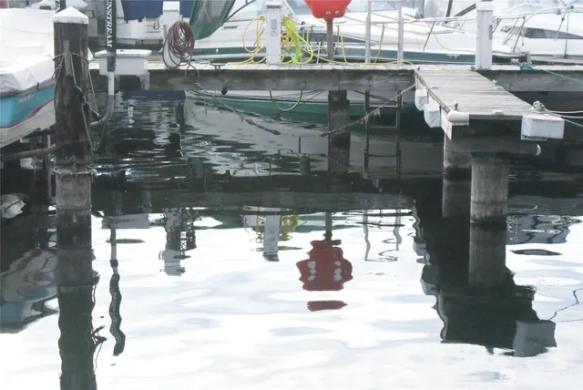 a view of a patio with table and chairs