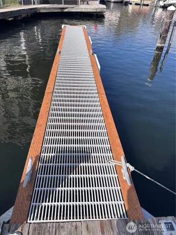 a view of balcony with wooden floor