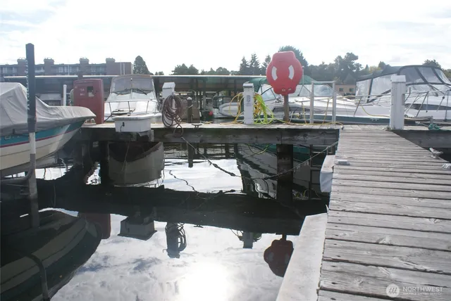 a view of roof deck with sitting area