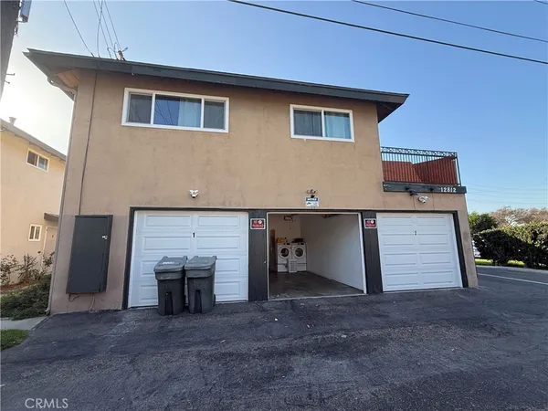 a view of a house with a garage