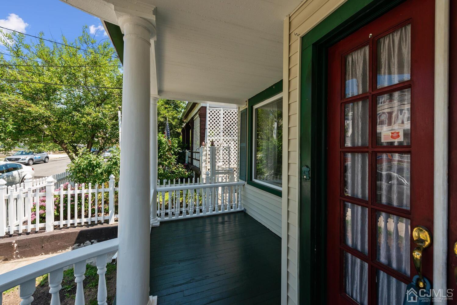 210 Rector Street Perth Amboy, NJ 08861 - Photo 2 of 24 a view of a balcony with wooden floor