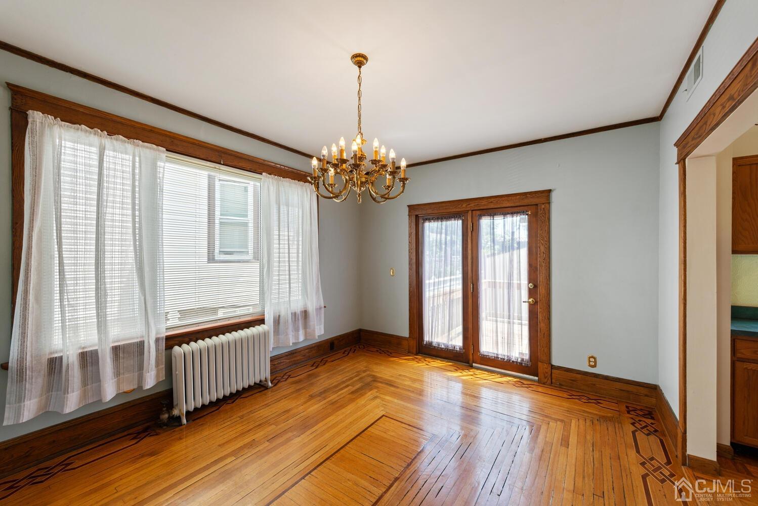 210 Rector Street Perth Amboy, NJ 08861 - Photo 11 of 24 a view of an empty room with a window