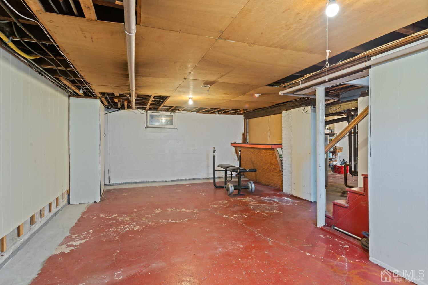 210 Rector Street Perth Amboy, NJ 08861 - Photo 21 of 24 a view of a room with rack on the wall