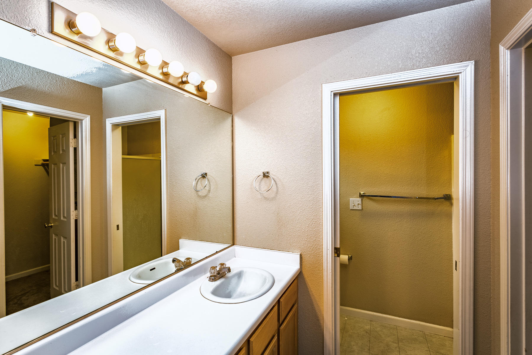 3339 Lawrence Road Redding, CA 96002 - Photo 12 of 18 a bathroom with a sink a shower and a mirror