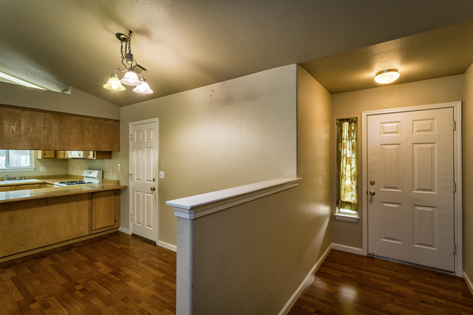 3339 Lawrence Road Redding, CA 96002 - Photo 3 of 18 a view of a kitchen with a sink and dishwasher refrigerator