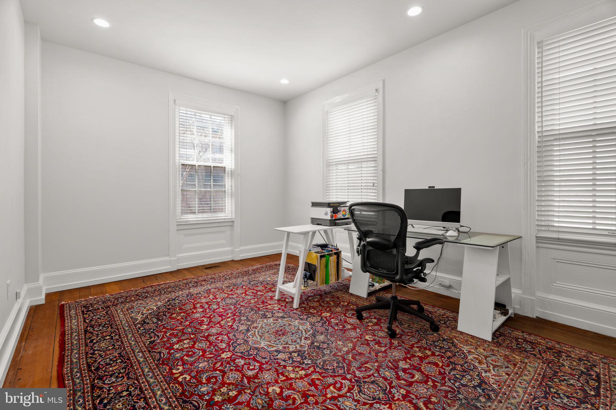 604 Spruce Street Philadelphia, PA 19106 - Photo 24 of 69 a view of a workspace with furniture and a window