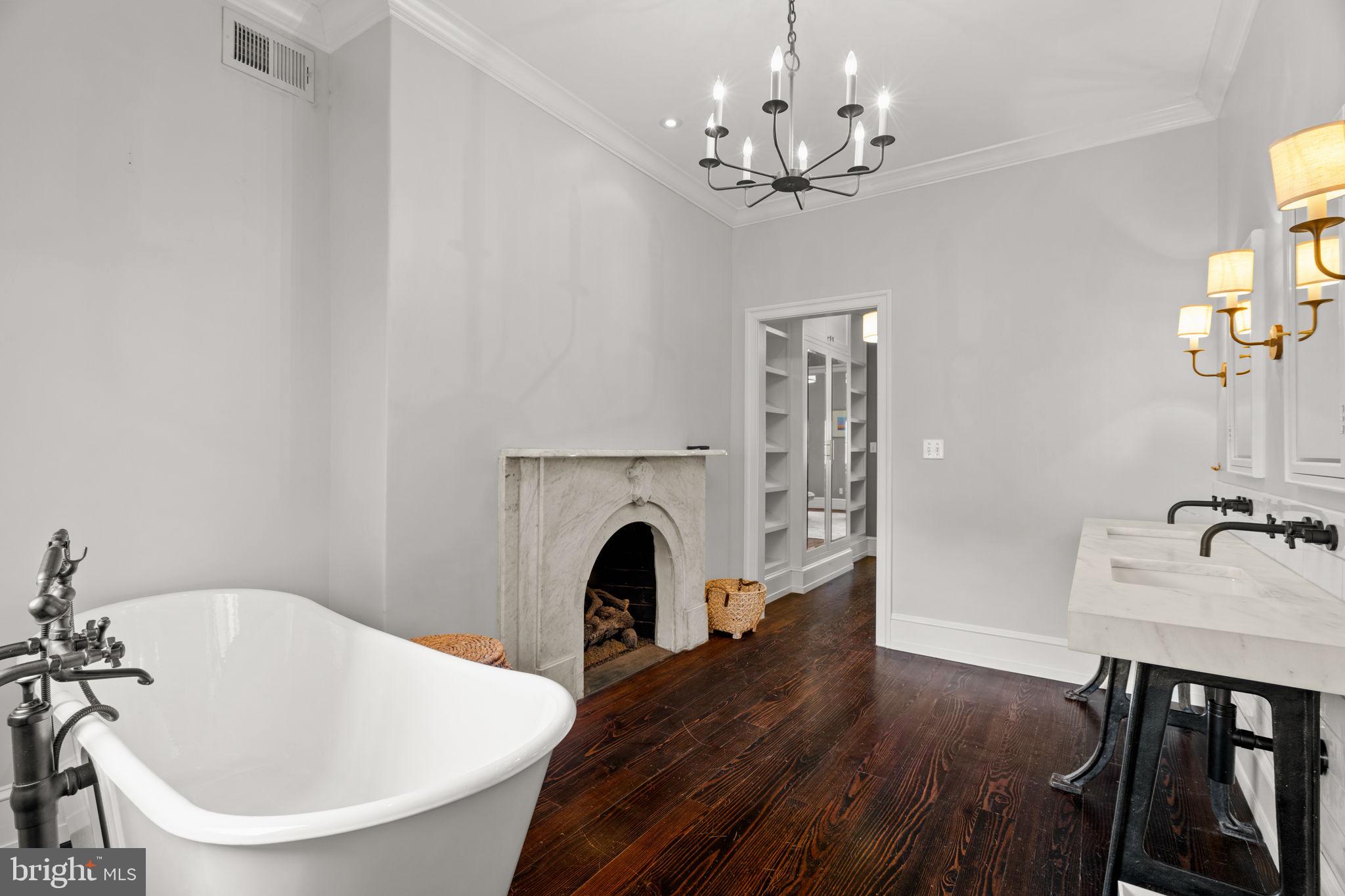 604 Spruce Street Philadelphia, PA 19106 - Photo 29 of 69 a view of a dining room with furniture and chandelier
