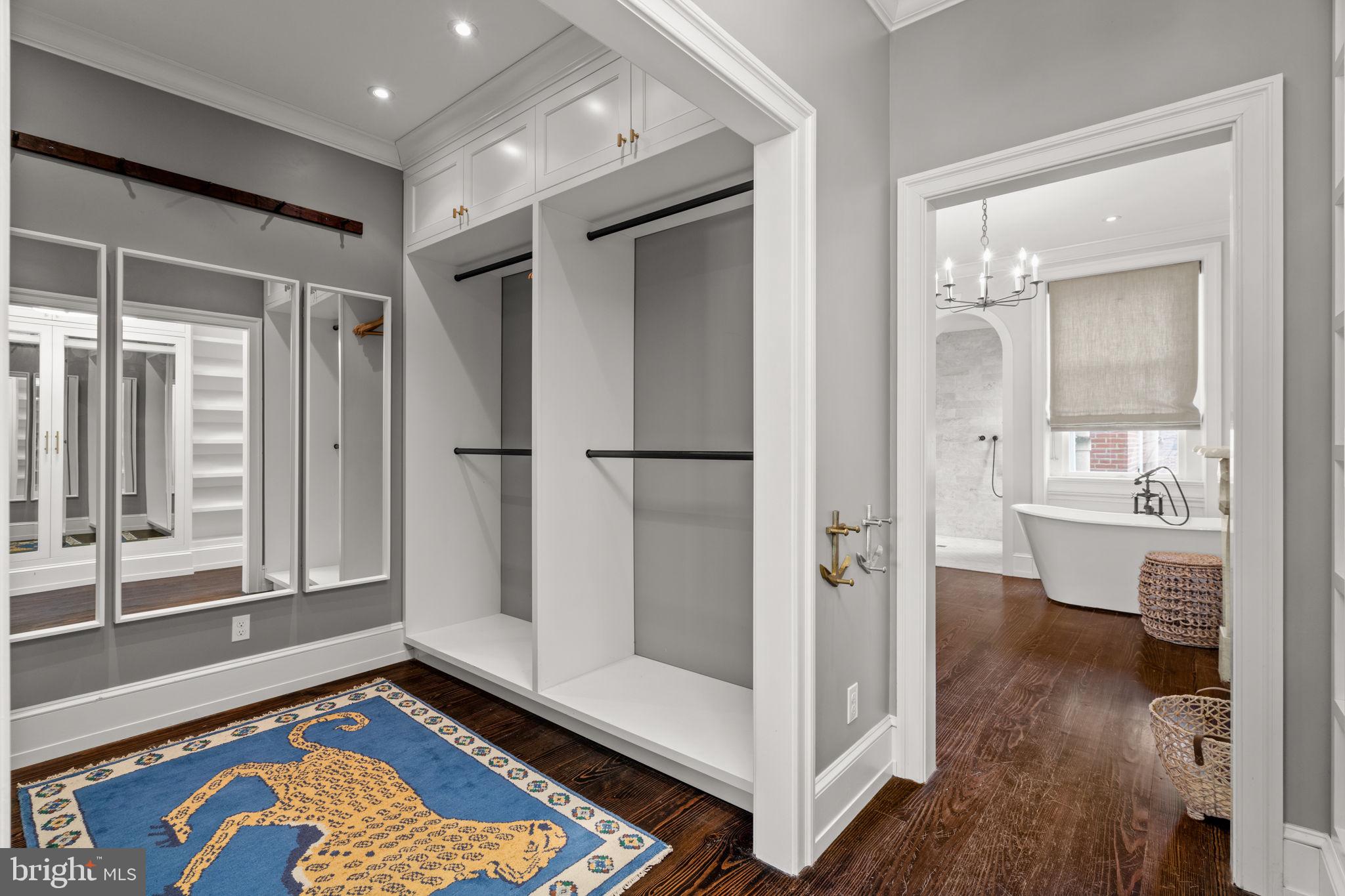 604 Spruce Street Philadelphia, PA 19106 - Photo 30 of 69 a view of a hallway with wooden floor and a bathroom