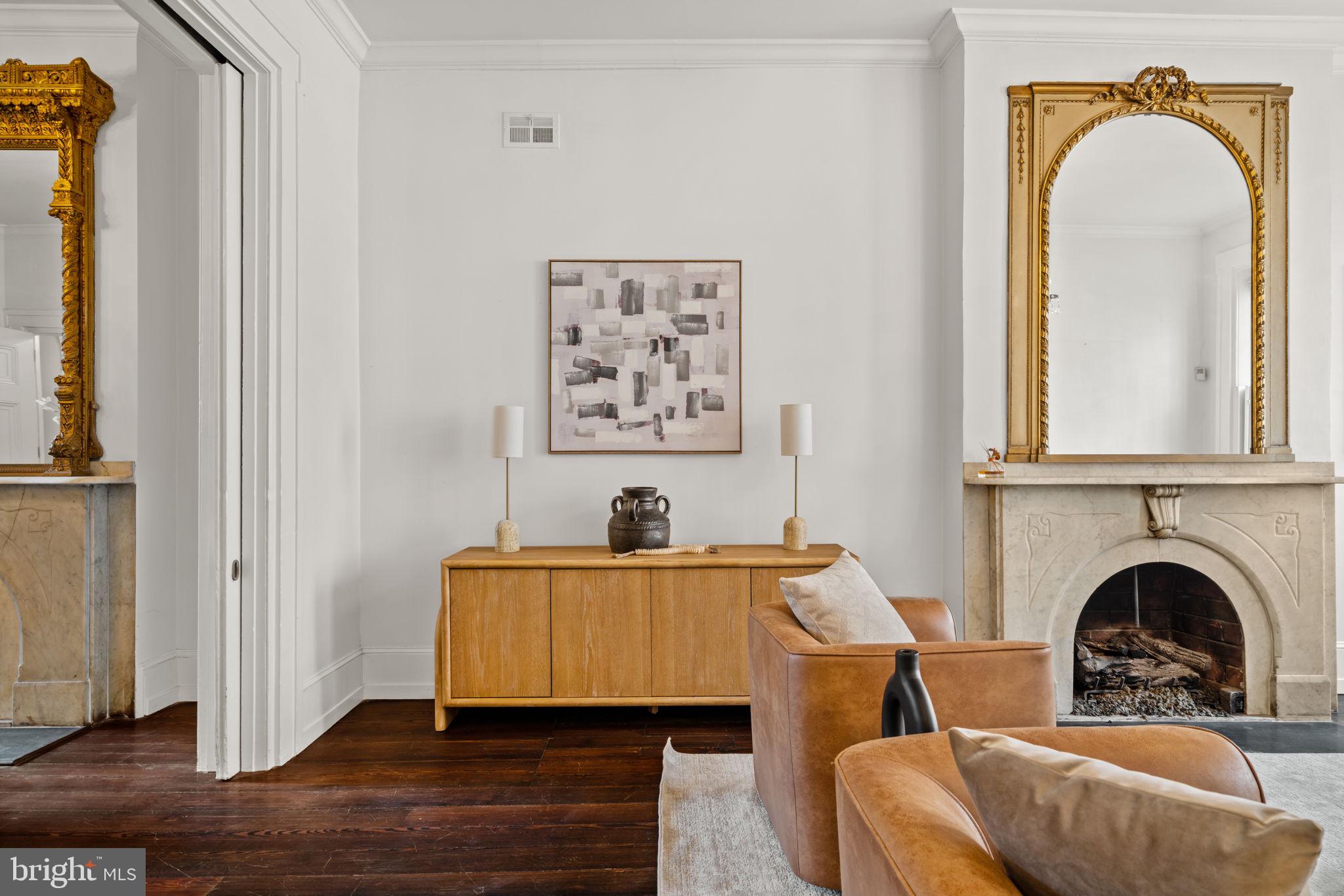 604 Spruce Street Philadelphia, PA 19106 - Photo 6 of 69 a living room with furniture and a fireplace