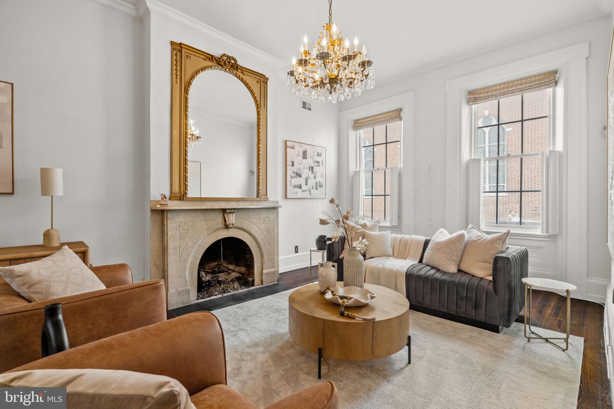 604 Spruce Street Philadelphia, PA 19106 - Photo 7 of 69 a living room with furniture fireplace and window
