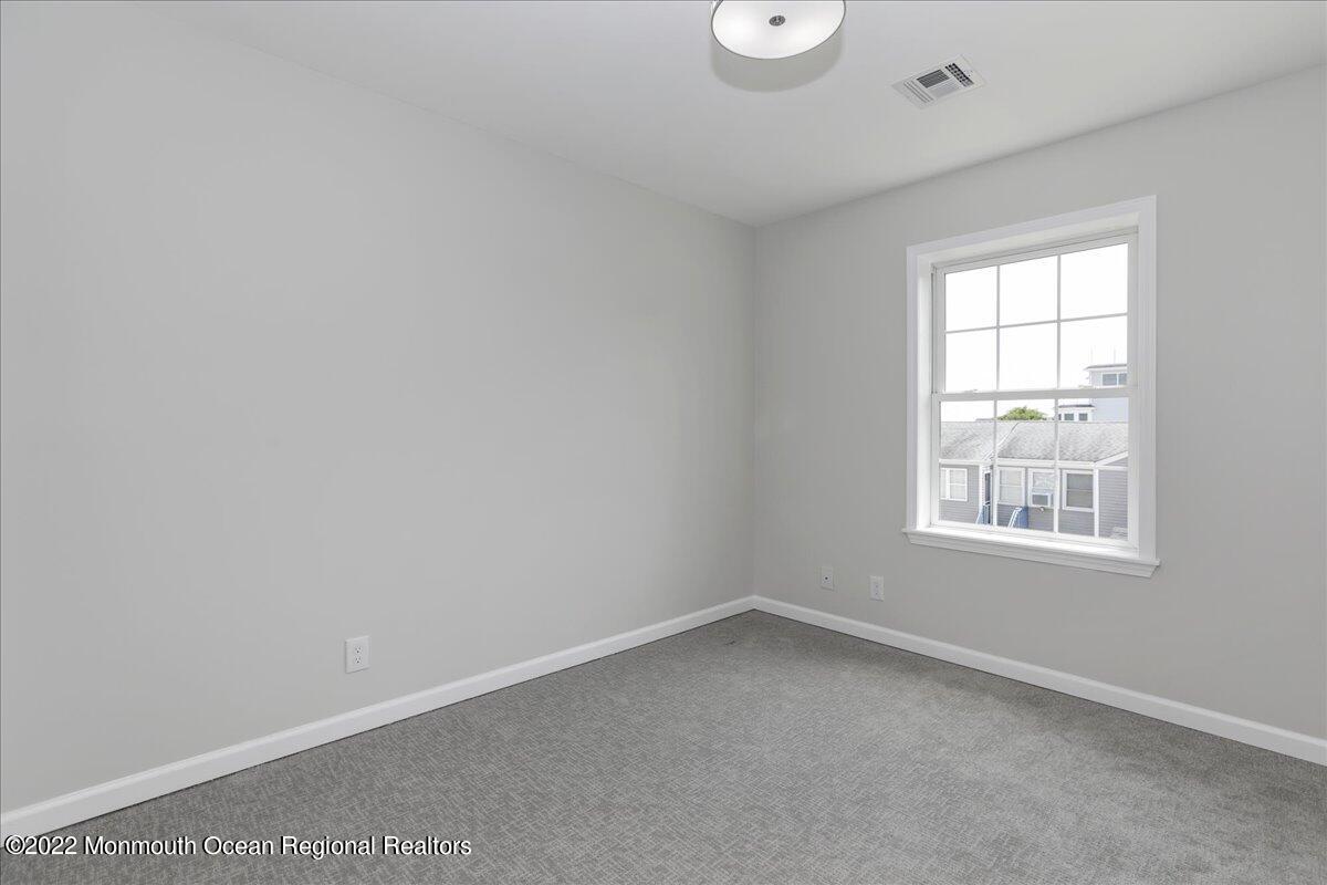 110 Island Road Toms River, NJ 08753 - Photo 29 of 51 an empty room with a window