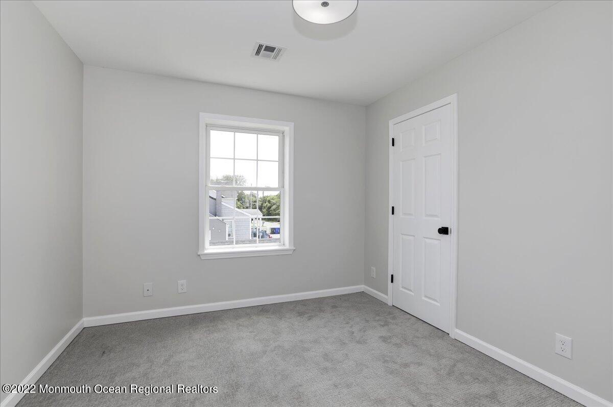 110 Island Road Toms River, NJ 08753 - Photo 30 of 51 an empty room with a window