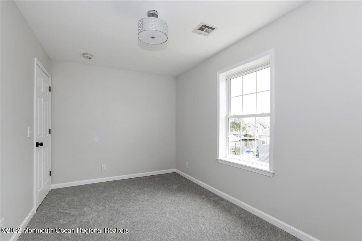 110 Island Road Toms River, NJ 08753 - Photo 33 of 51 an empty room with a window