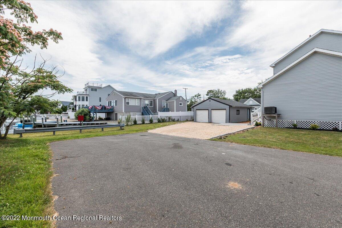 110 Island Road Toms River, NJ 08753 - Photo 41 of 51 a view of the house with a swimming pool