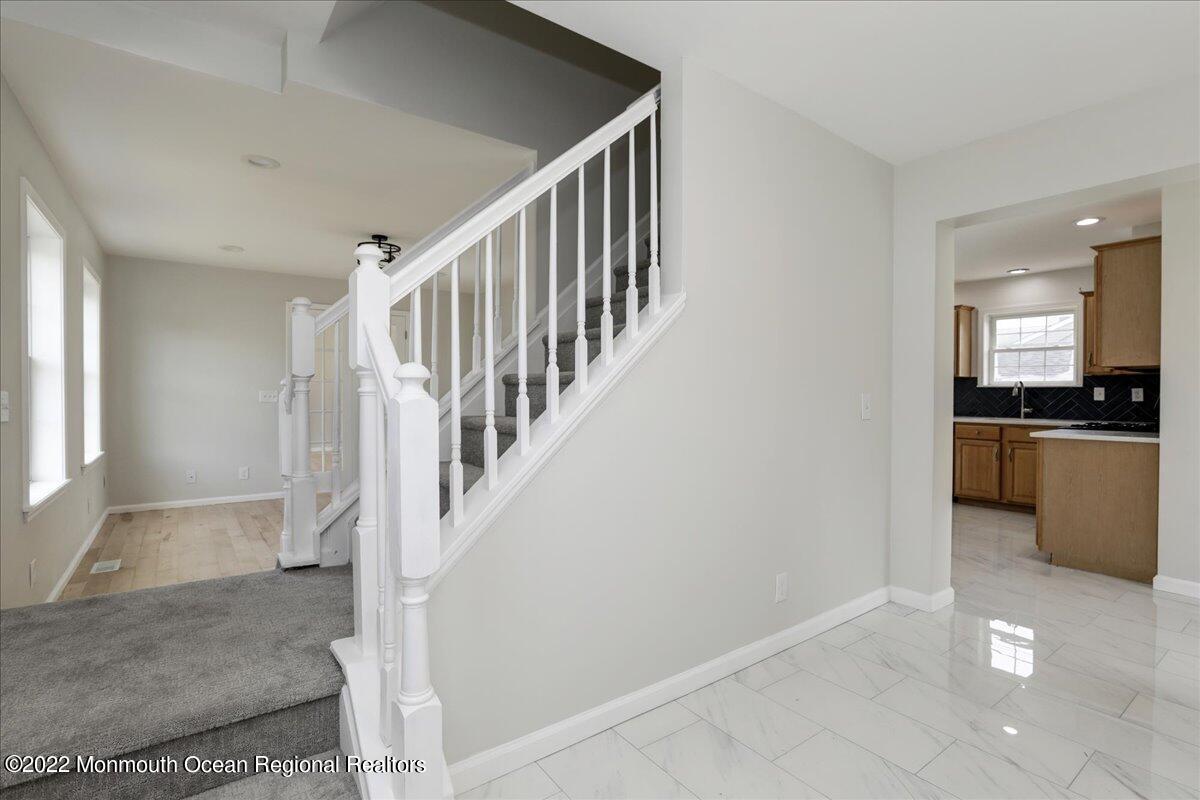 110 Island Road Toms River, NJ 08753 - Photo 6 of 51 a view of a kitchen with furniture and an entryway
