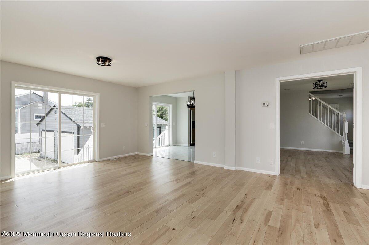 110 Island Road Toms River, NJ 08753 - Photo 10 of 51 wooden floor in an empty room with a window