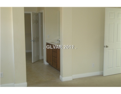 521 Ivy Spring Street Las Vegas, NV 89138 - Photo 15 of 18 Master Bedroom.