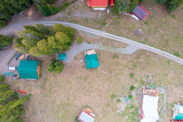 a view of a balcony with chairs and a table