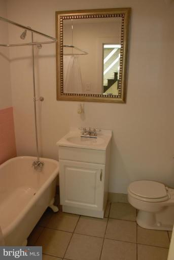 4204 Falls Road Baltimore, MD 21211 - Photo 13 of 21 Full bath w/original claw foot tub in lower level.