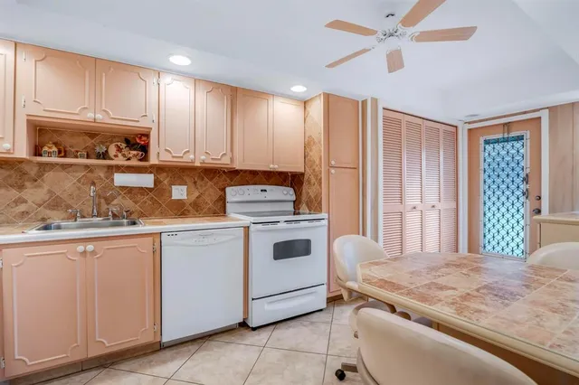 a view of a livingroom with furniture and a table