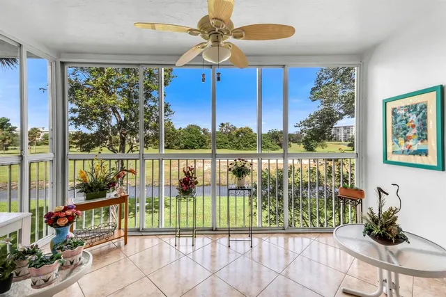 a view of a house that has a garden