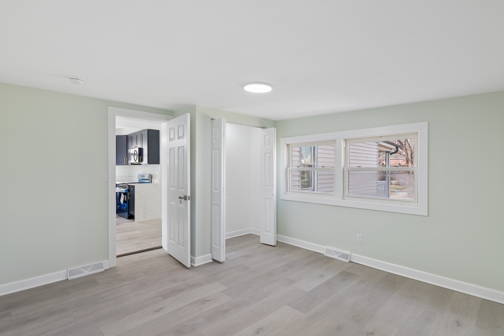 6347 South Kenneth Avenue Chicago, IL 60629 - Photo 13 of 40 an empty room with windows and closet