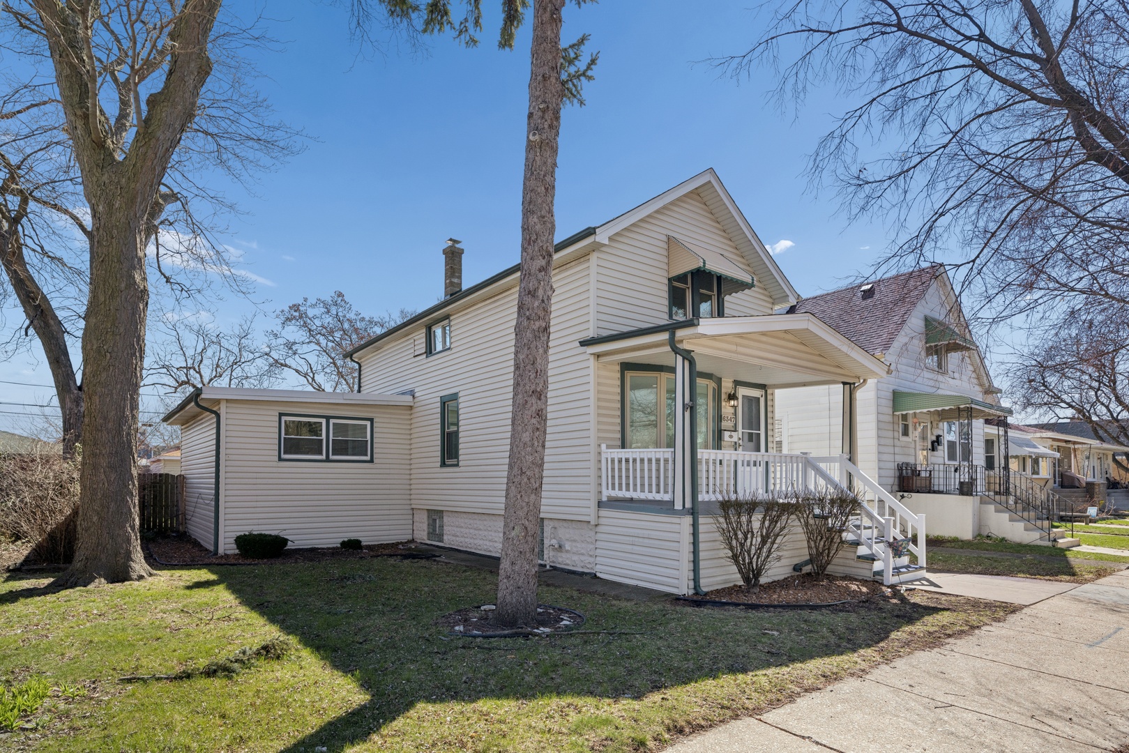 6347 South Kenneth Avenue Chicago, IL 60629 - Photo 2 of 40 a front view of a house with a yard