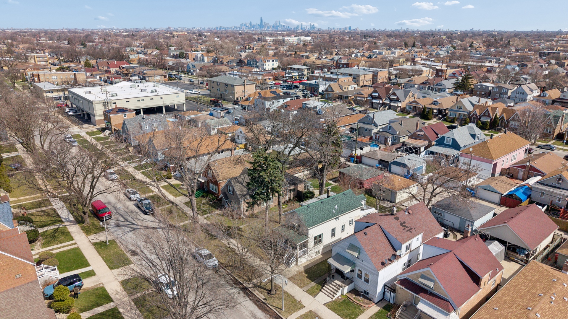 6347 South Kenneth Avenue Chicago, IL 60629 - Photo 31 of 40 an aerial view of a city with lots of residential buildings
