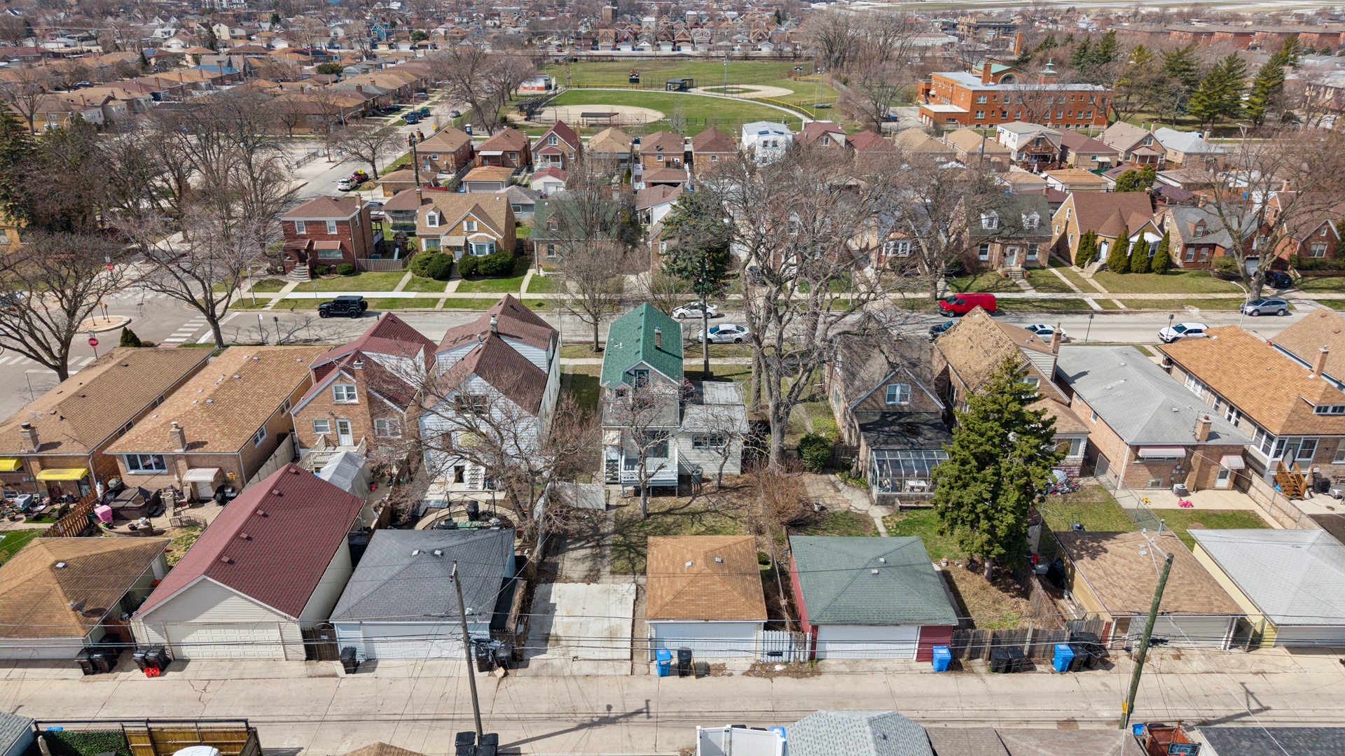 6347 South Kenneth Avenue Chicago, IL 60629 - Photo 33 of 40 an aerial view of residential houses with outdoor space and parking