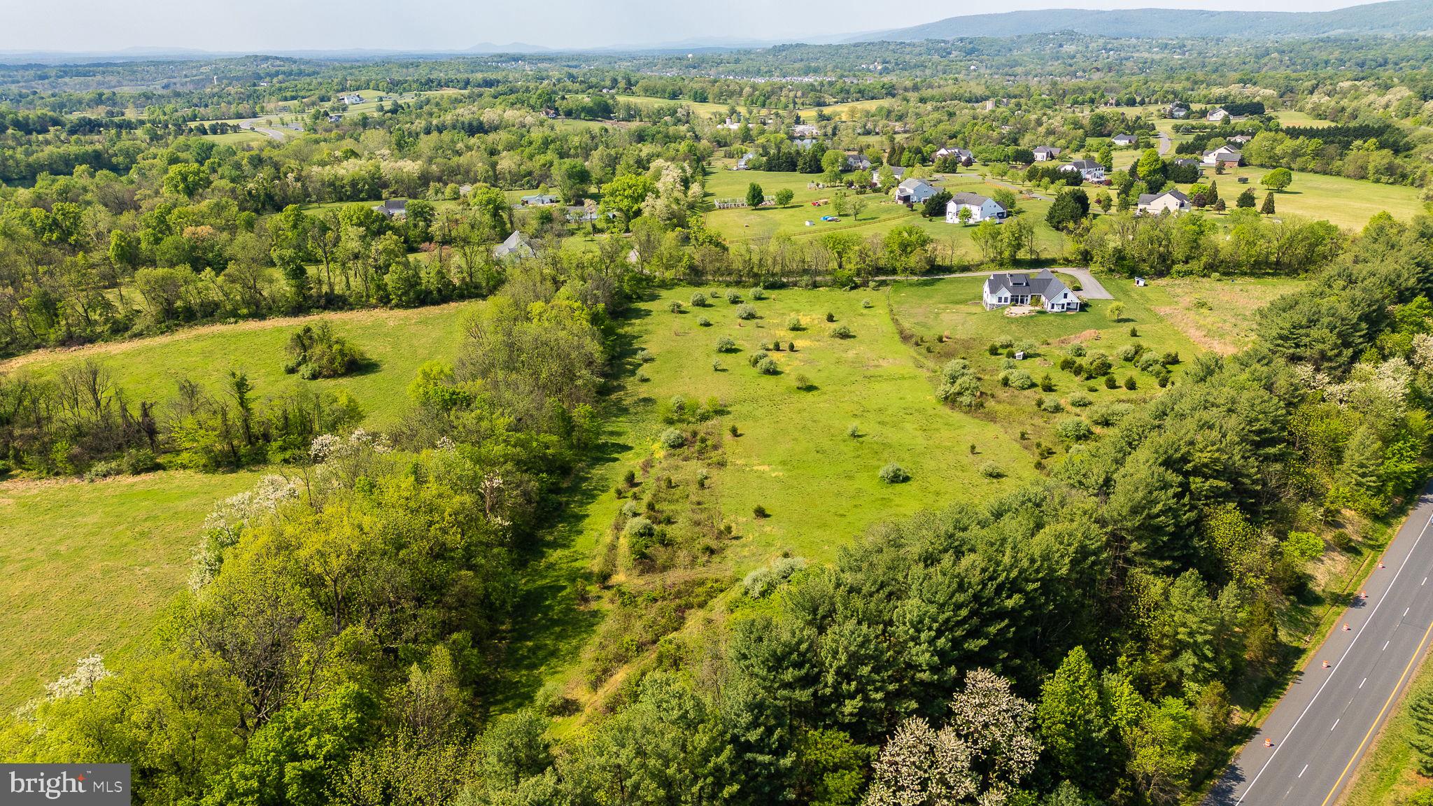 Lot 24 Simmons Road Purcellville, VA 20132 - Photo 6 of 13 an aerial view of residential houses with outdoor space and trees