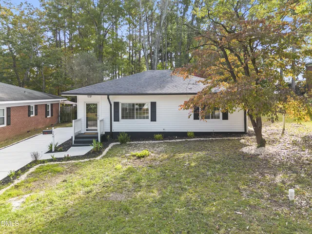 a house view with a outdoor space