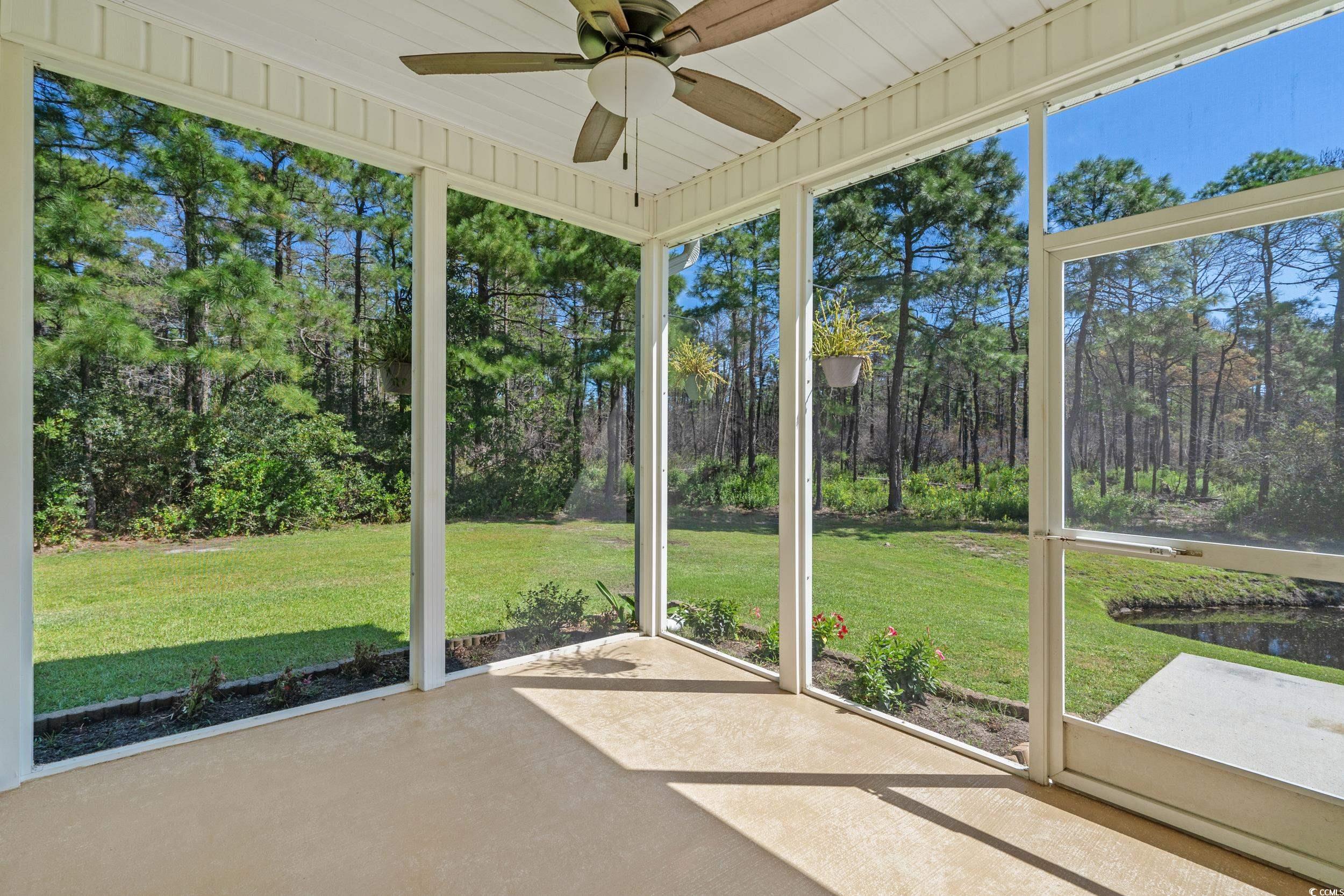 562 Tuckahoe Road Myrtle Beach, SC 29579 - Photo 27 of 40 Unfurnished sunroom featuring ceiling fan and plenty of natural light