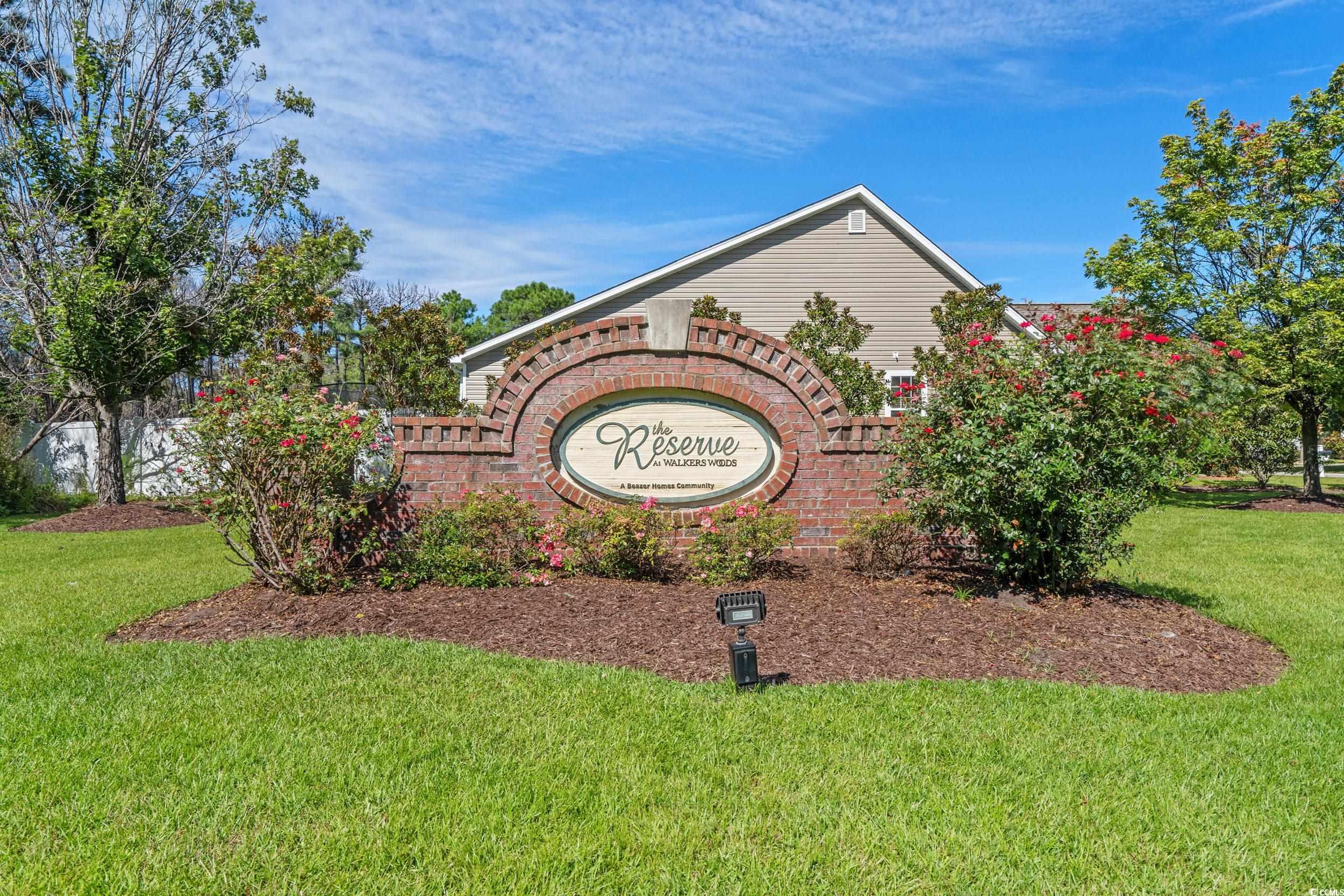 562 Tuckahoe Road Myrtle Beach, SC 29579 - Photo 33 of 40 Community / neighborhood sign with a yard