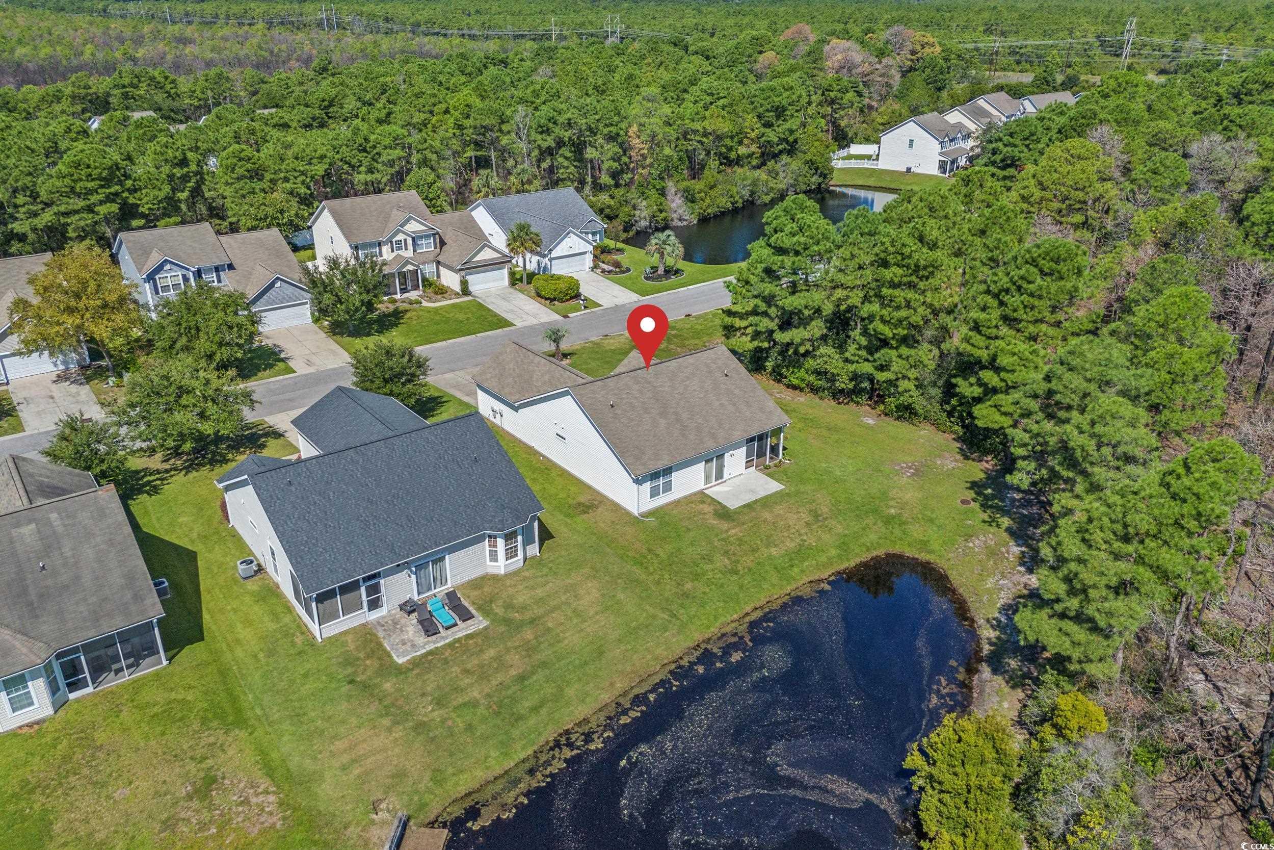 562 Tuckahoe Road Myrtle Beach, SC 29579 - Photo 35 of 40 Aerial view of residential area featuring a nearby body of water