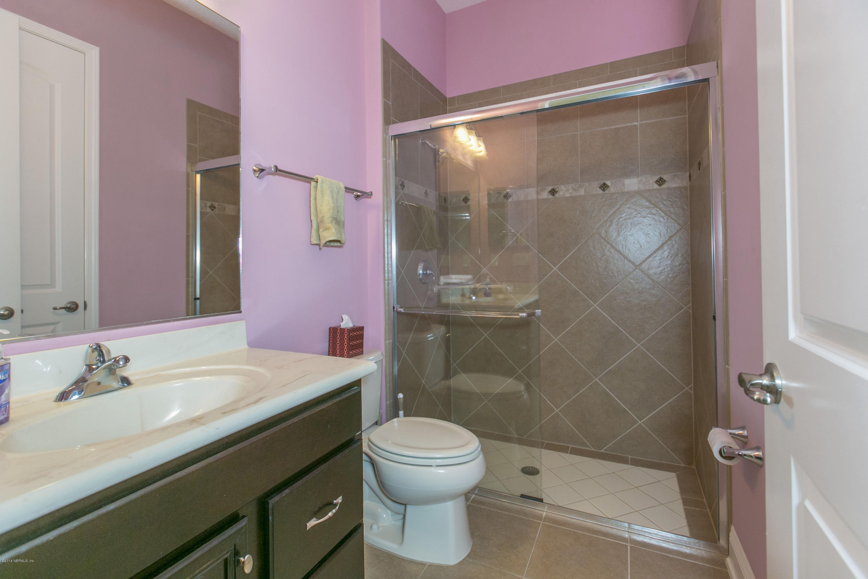 58 Pelican Pointe Road Ponte Vedra, FL 32081 - Photo 15 of 28 a bathroom with a sink a toilet and shower