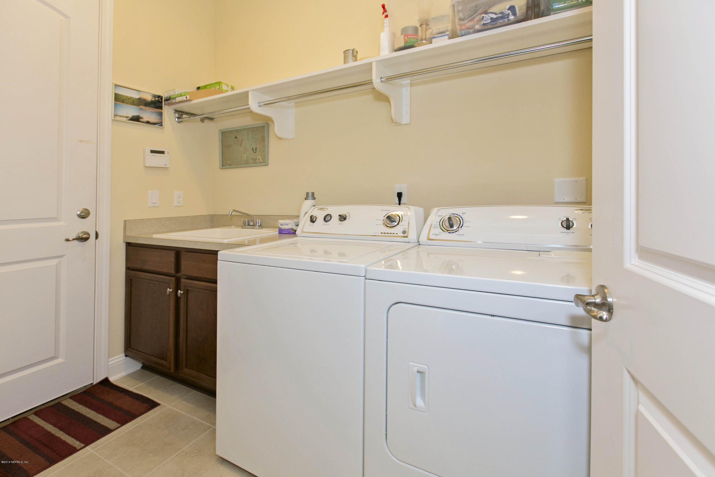 58 Pelican Pointe Road Ponte Vedra, FL 32081 - Photo 18 of 28 a utility room with dryer and washer
