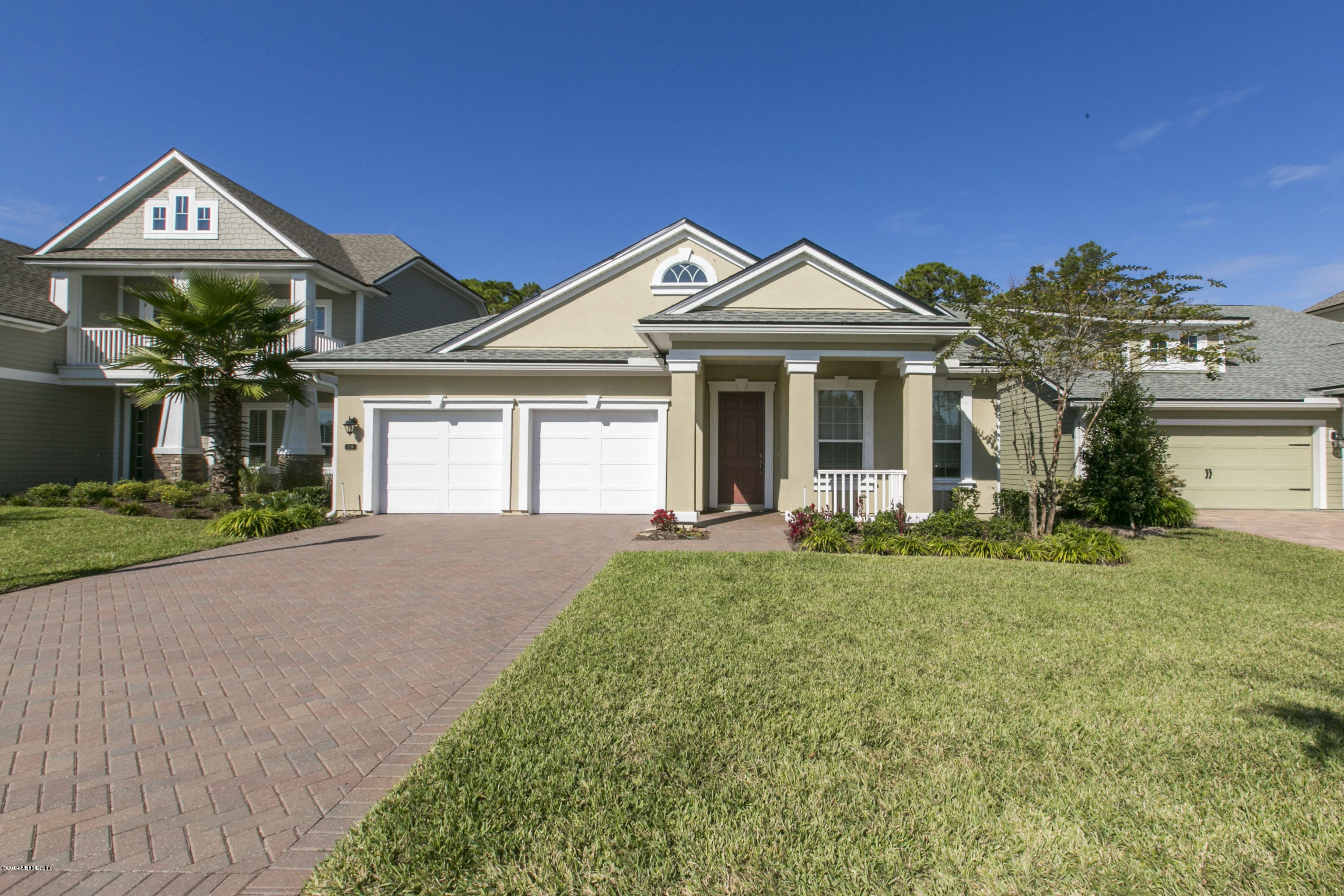 58 Pelican Pointe Road Ponte Vedra, FL 32081 - Photo 2 of 28 a front view of a house with a yard